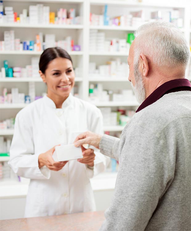 pharmacist talking to a patient.